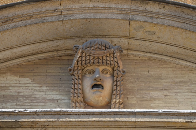 Theatrical mask from the South Theatre (Odeum) at Hadrian's Villa, female figure of tragedy wearing the onkos (topknot), Cortile del Belvedere, Vatican Museums. Image © Carole Raddato.